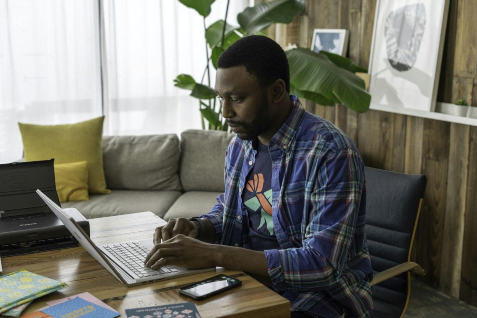 Business owner reviewing quarterly financial reports